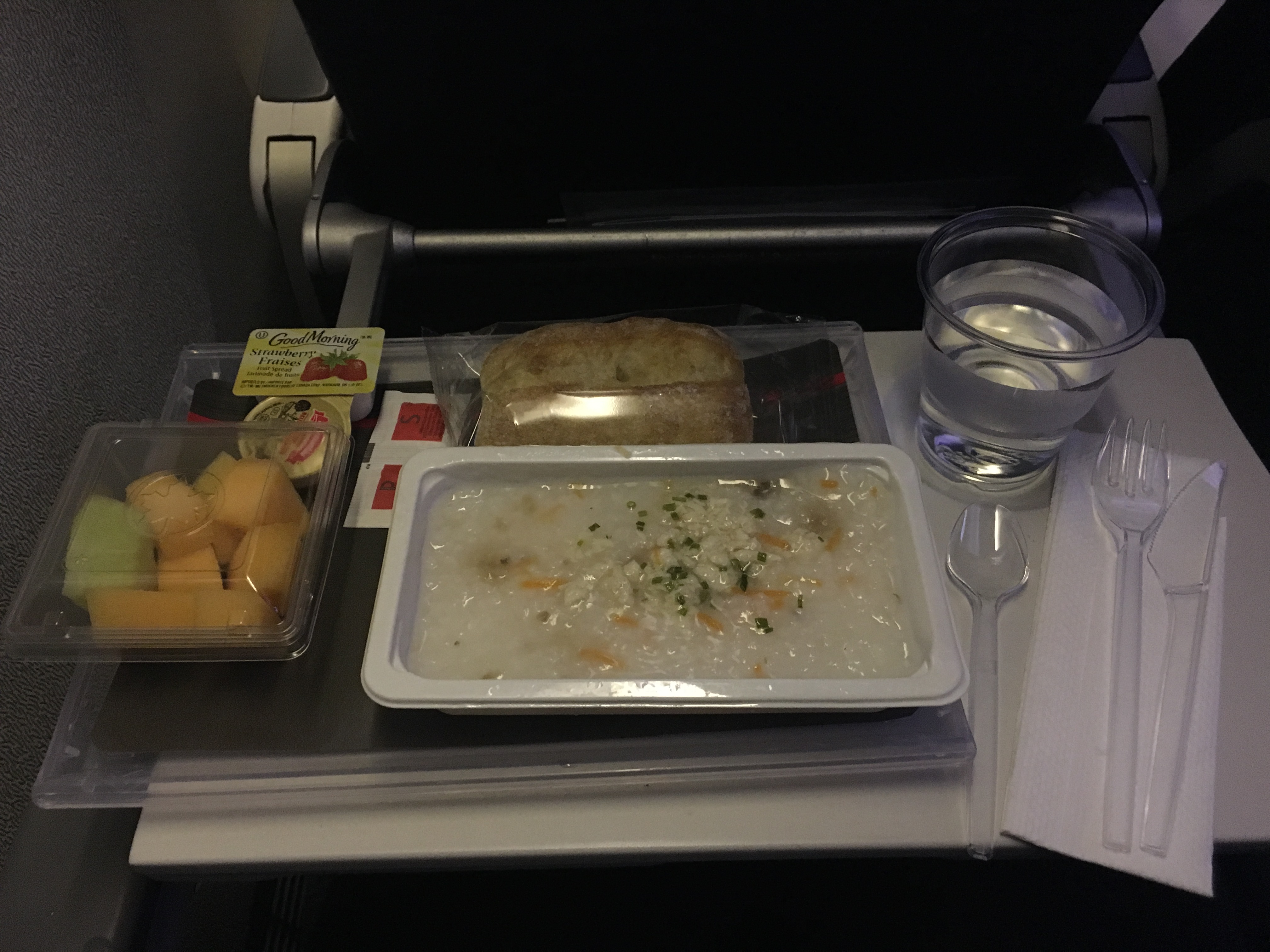 Breakfast served in flight.  Melon, yum.
